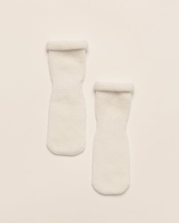 Babysokjes van Merino Wol & Kasjmier by Knitas biologisch katoen hypoallergeen gevoelige huid eczeem baby ademend baby essentials baby sokjes duurzame babykleding eczeem vriendelijk hypoallergeen kasjmier kraamcadeau merino wol natuurlijke kleuren newborn sokjes premium warme sokjes winter zachte boordjes
