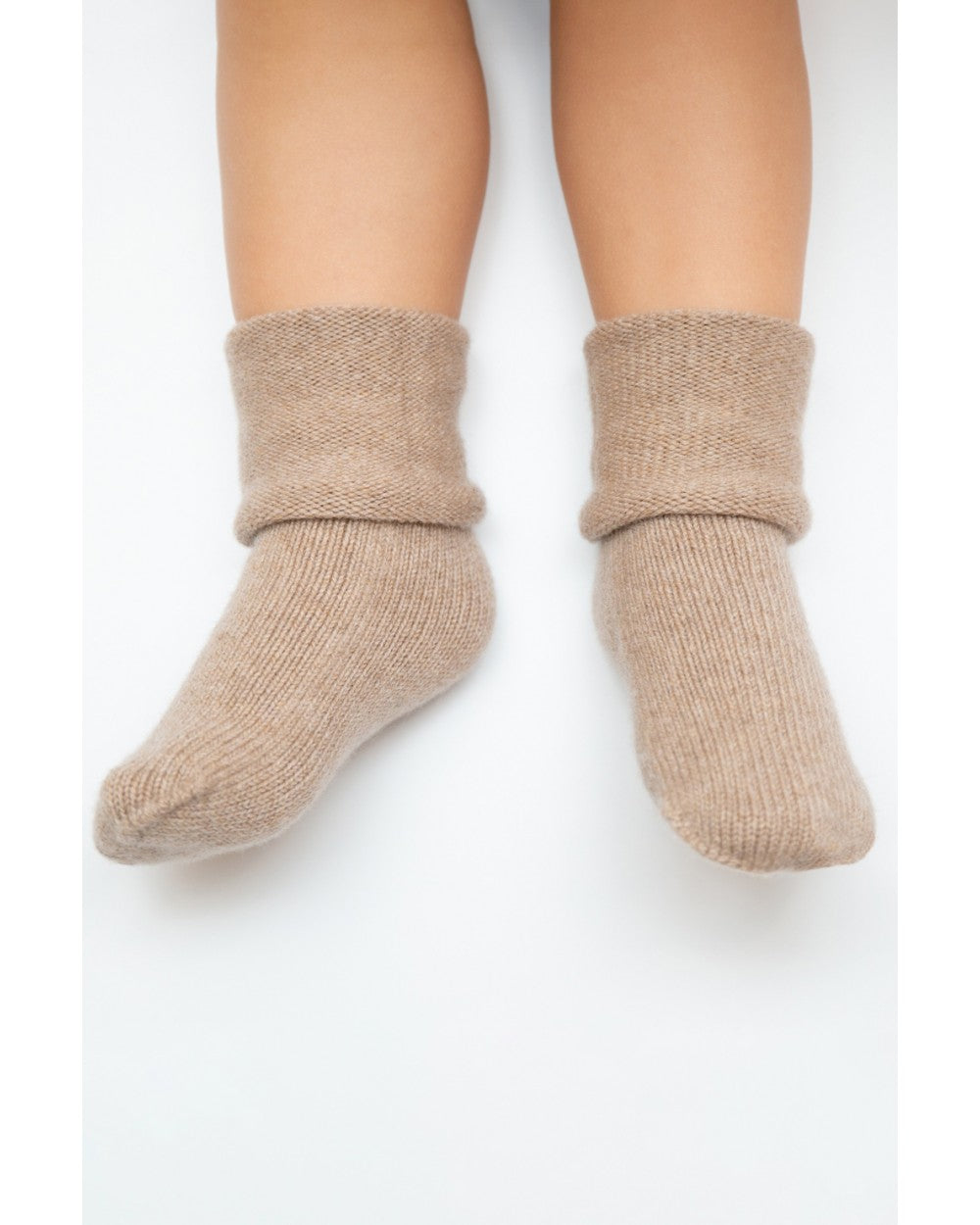 Babysokjes van Merino Wol & Kasjmier by Knitas biologisch katoen hypoallergeen gevoelige huid eczeem baby ademend baby essentials baby sokjes duurzame babykleding eczeem vriendelijk hypoallergeen kasjmier kraamcadeau merino wol natuurlijke kleuren newborn sokjes premium warme sokjes winter zachte boordjes